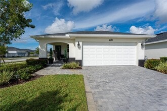 Building Photo - 6172 NW Sweetwood Dr