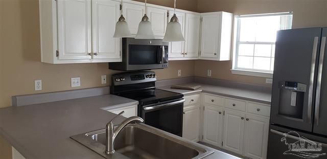 Building Photo - Spacious yard close to NAS and Navy Federal!