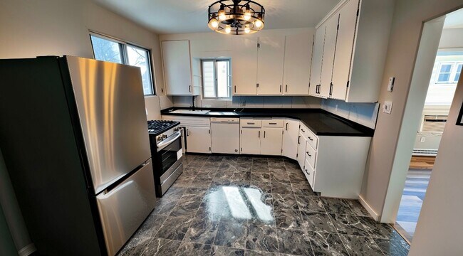 Building Photo - Charming Newly Renovated 3-Bedroom Rental with Garage & Basement