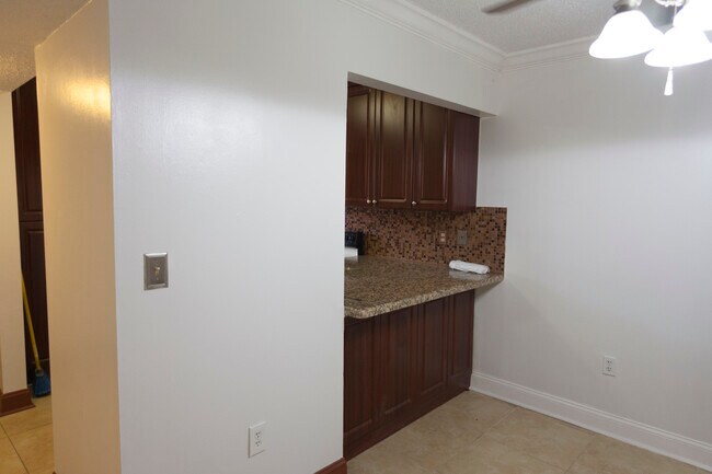 Counter to Dining Area - 6081 W 24th Ave