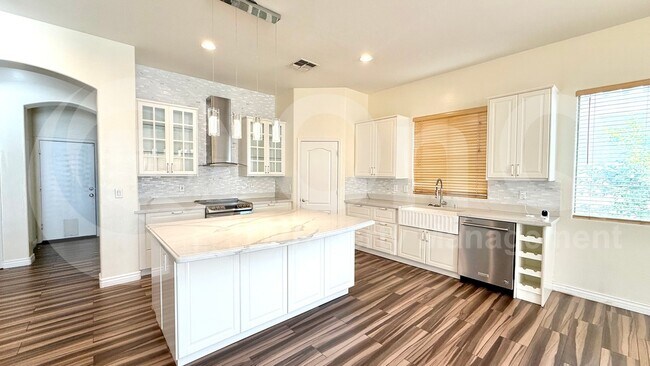 Building Photo - 6320 S Black Hills Way