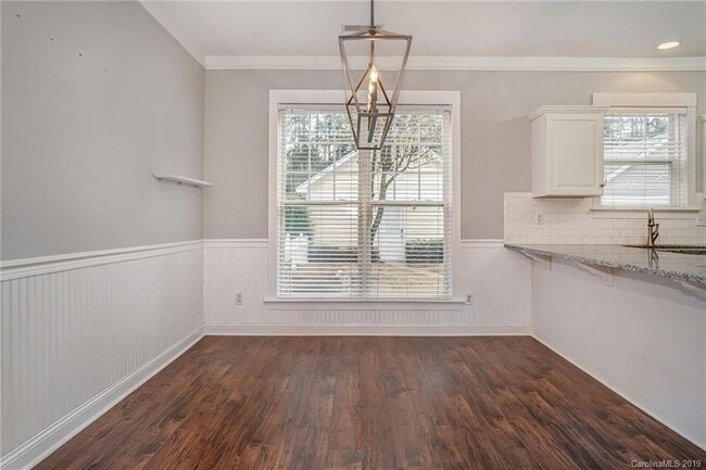 Dinning room with updated lighting - 11323 Deer Ridge Ln House