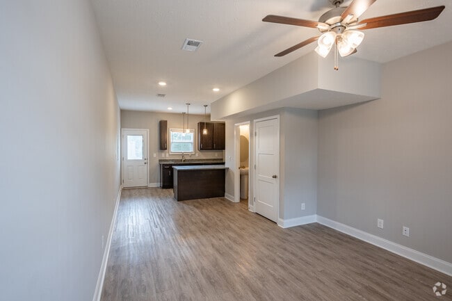 2BR, 2.5BA - 1,100SF - Living Room - Golf Club Ln - 1625