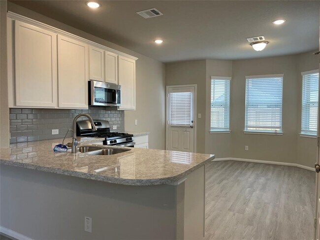 Foto del edificio - 8403 Moonlight Bay Cir