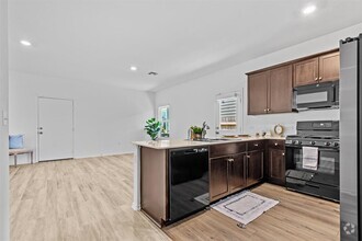 Building Photo - 7711 Poppy Petal Dr