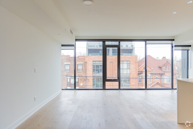 1BR + DEN, 1BR - 900SF - Living Room - College West