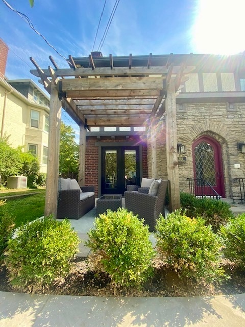 Unit 2 has stone patio, pergola, and French doors - 3514 Mooney Ave