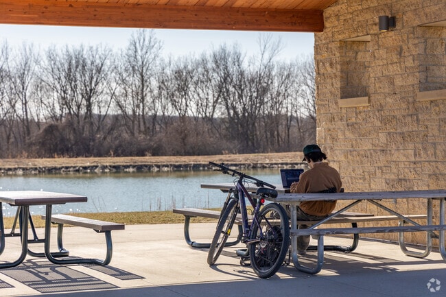 Terra Park just in Johnston has a beautiful lake to take a break from biking at.