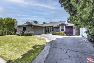Building Photo - 6044 Varna Ave