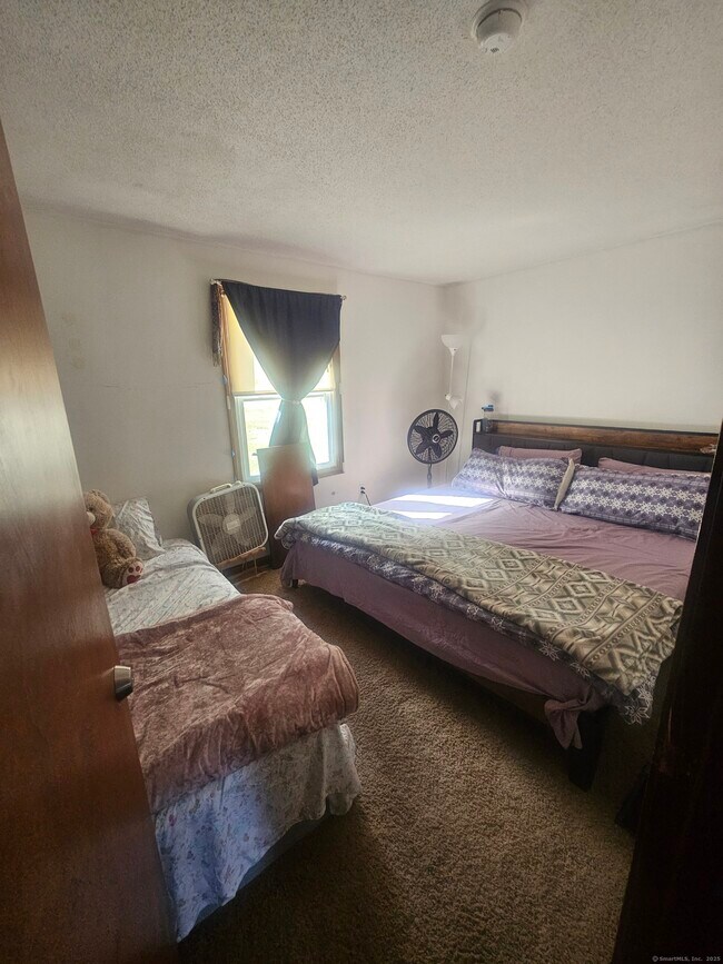 Foto del edificio - 49 Long Meadow Dr