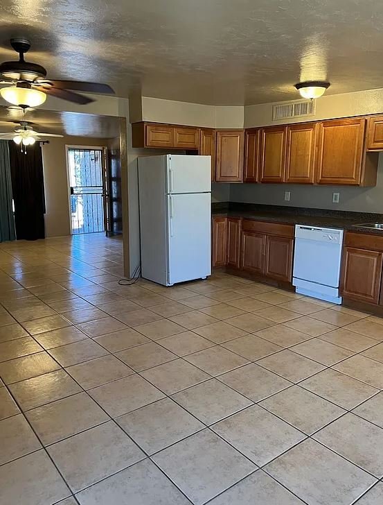 Building Photo - 6027 S Lostan Ave