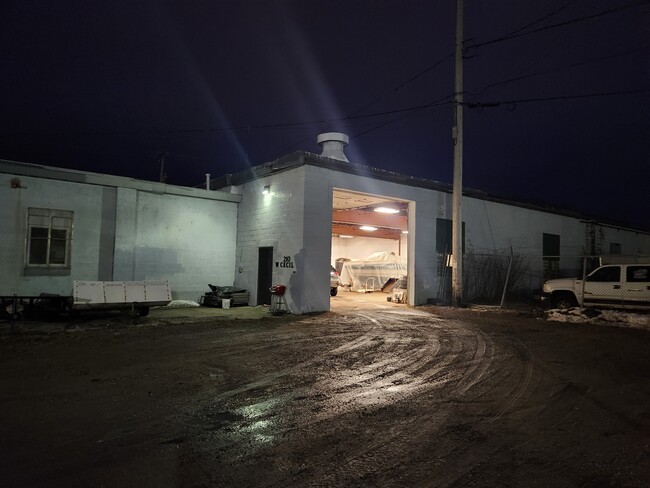 14' overhead door and service door - 210 W Cecil St