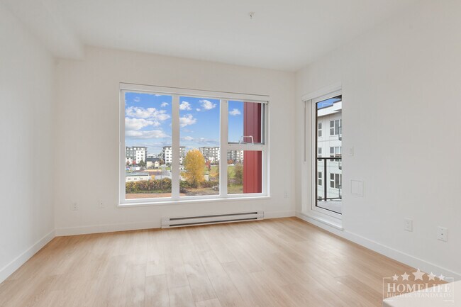 Building Photo - Contemporary 1-Bedroom + Den Home at The D...