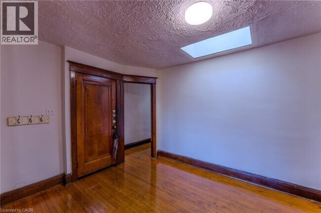 Building Photo - 1369 Main St E