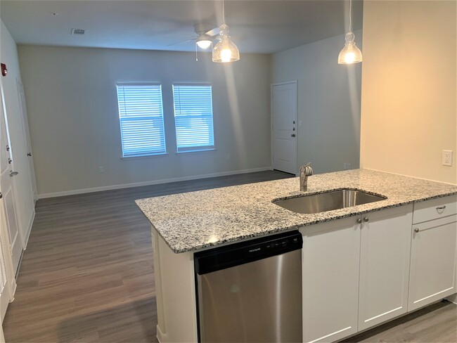 Kitchen looking towards Living - Flats at Van Alstyne