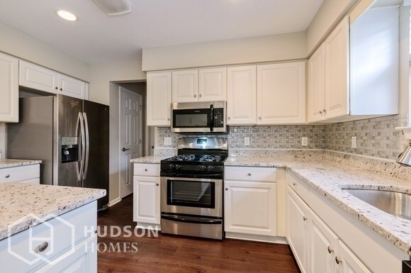 Building Photo - 1201 Whispering Woods Dr