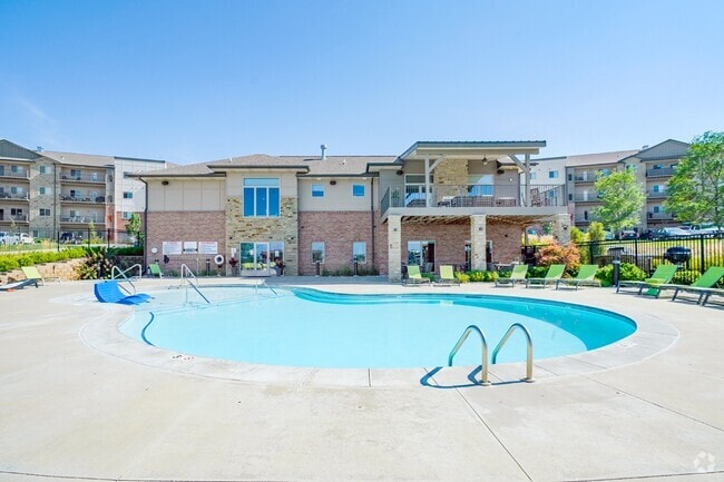 There's no better way to beat the heat than taking a dip in our resort-style pool. - The Flats at 84