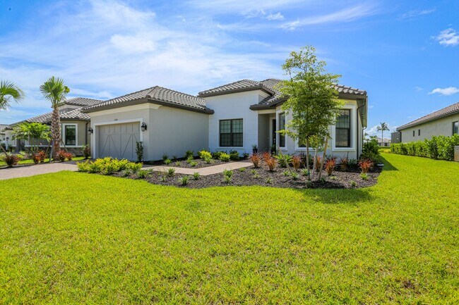 Foto del edificio - BRAND NEW** STUNNING POOL HOME**PROFESSIONALLY DECORATED**3 BEDS + DEN/ 3 FULL BATHS***ESPLANADE ...