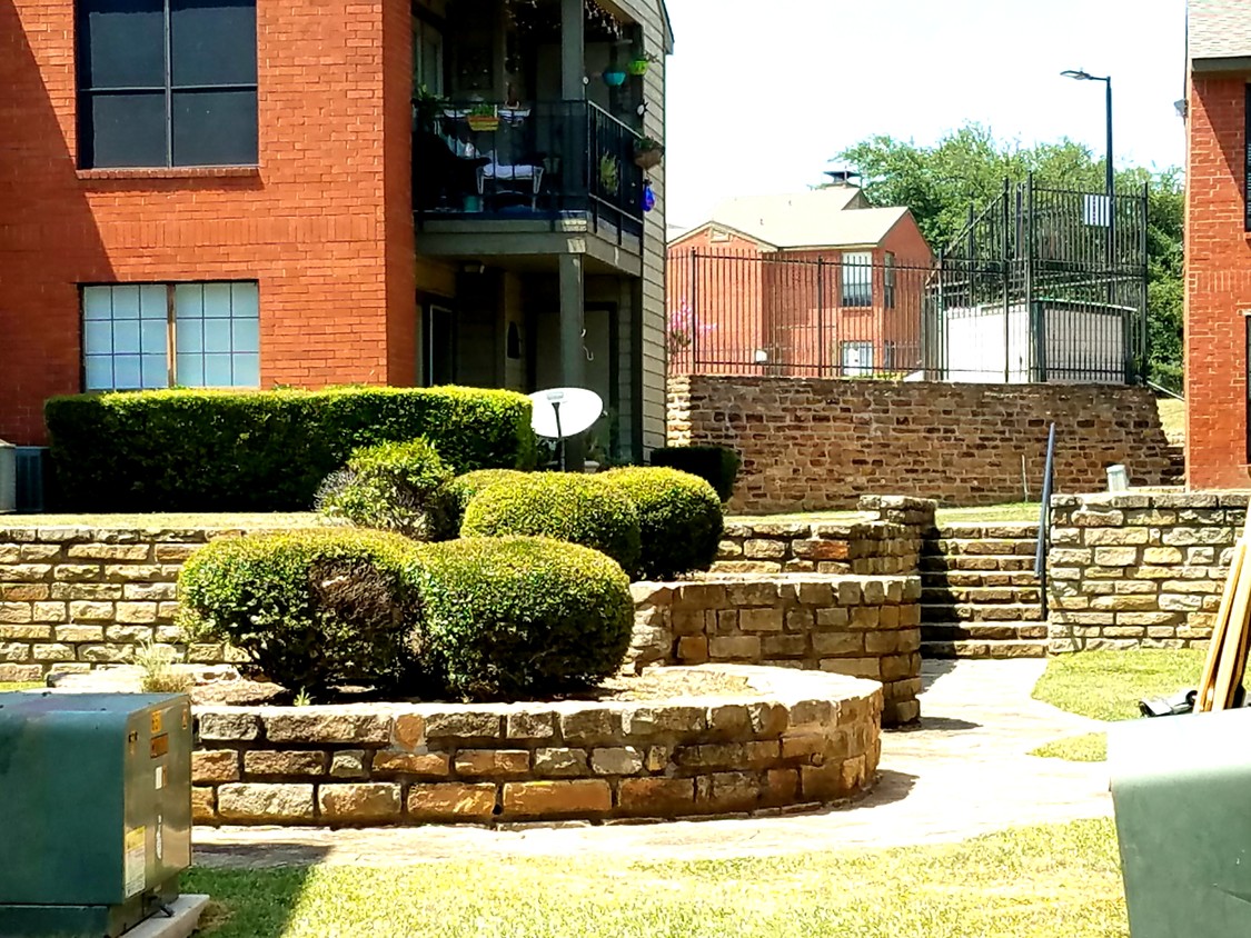 View of courtyard from back patio. - 5905 Lake Hubbard Pkwy