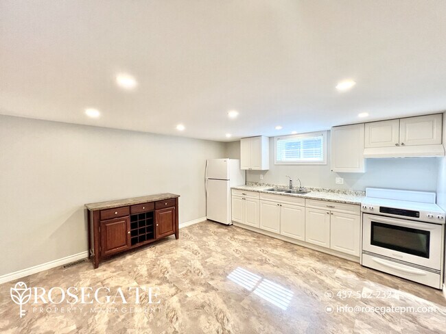 Photo du bâtiment - Spacious 1-Bedroom Basement Apartment in P...