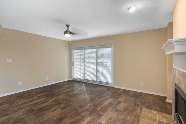 Living Room with Fireplace - Lake Village West Apartments