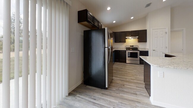 Building Photo - Move-In Ready!  Stunning 4 BR/2 BA Home in...