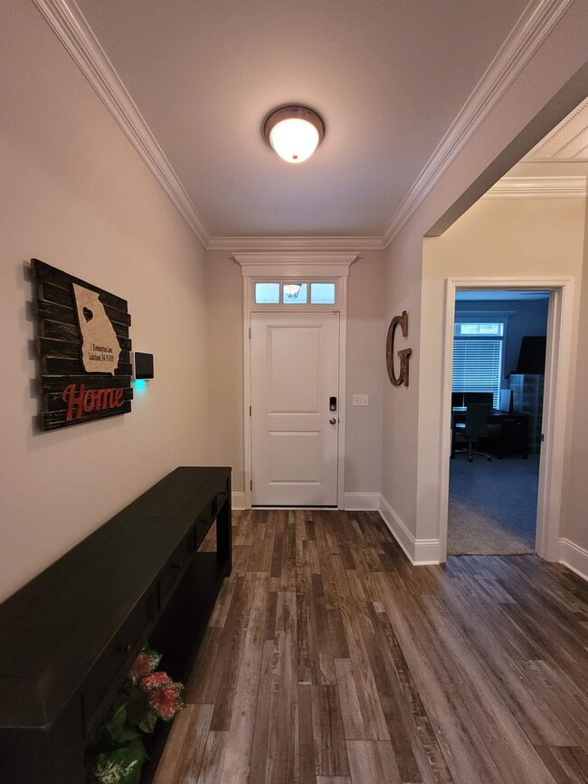 Building Photo - Serene Living in Patriots Point: 4BR/3BA H...