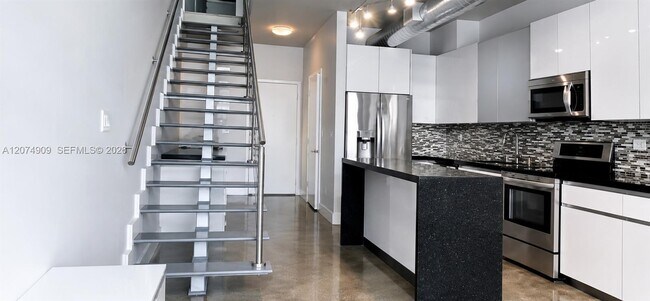 Building Photo - 690 SW 1st Ct