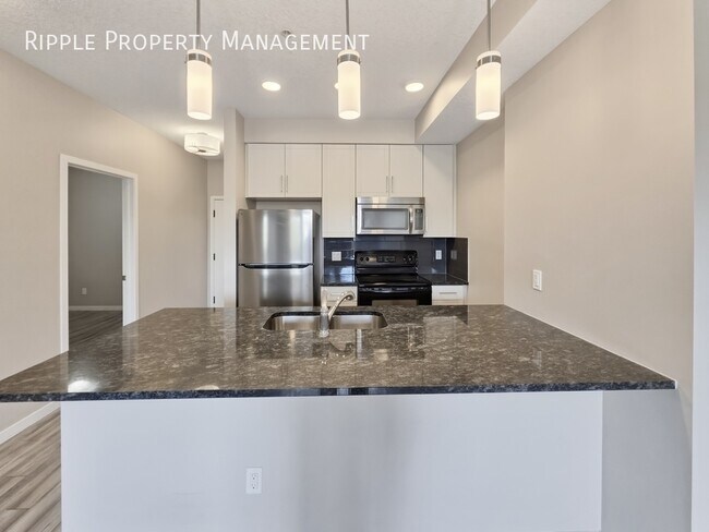 Building Photo - CHARMING 2 BEDS, 1 BATH CONDO | LAKESIDE LIVING IN MAHOGANY
