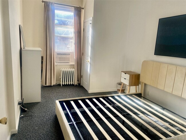 Building Photo - 92-02-92-37 37th Ave