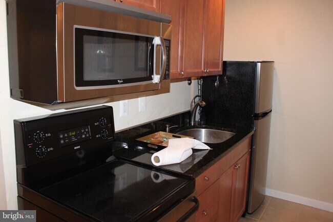 Building Photo - 8504 Quaint Ln