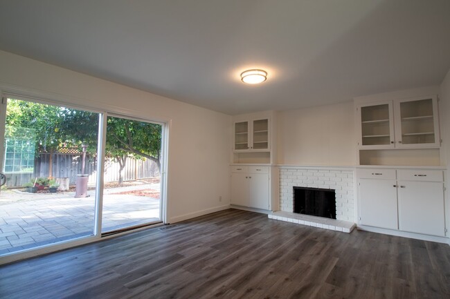 Formal dining room with fireplace and built-in cabinets - 138 Piedmont Ct