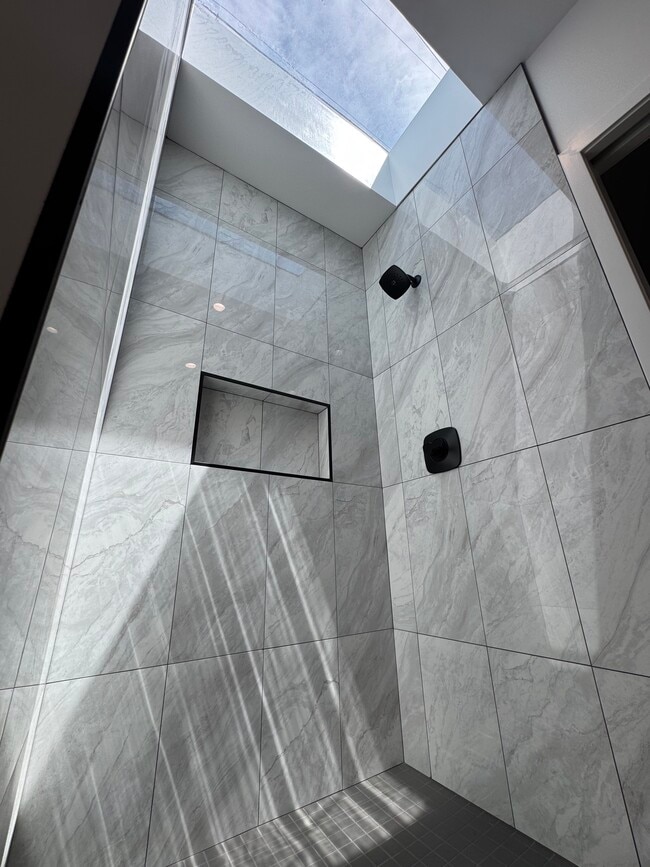 Shower with a skylight - 7834 S Harvard Blvd