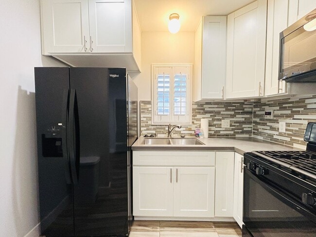 Building Photo - 8828 Haas Ave