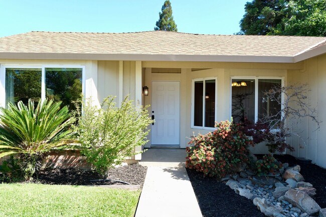 Building Photo - Centrally Located 4-Bedroom Home with Spac...