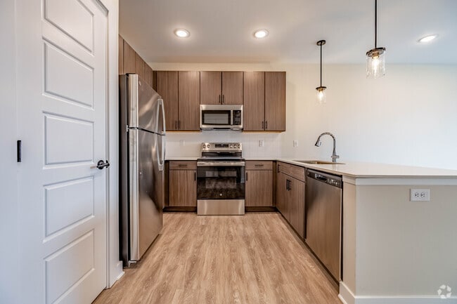 1BR, 1BA - 843SF - Kitchen - The District at Deerfield Residences