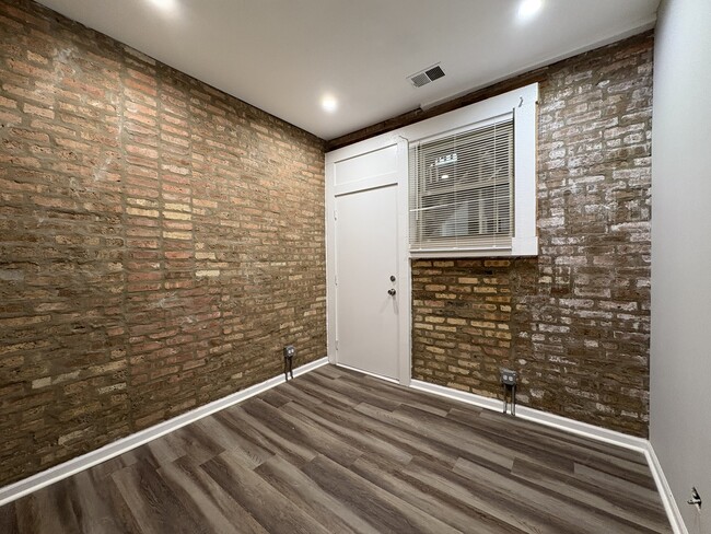 Building Photo - 1649 W Pratt Blvd
