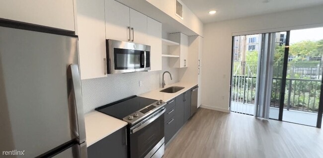 Building Photo - 2 br, 2 bath Condo - 3060 NE 6th Ave. 403