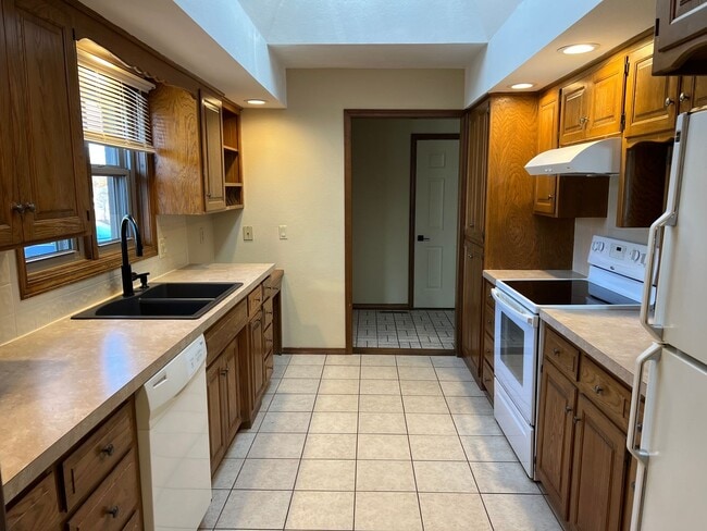 Building Photo - PRICE ADJUSTMENT! Lakewood Village Duplex