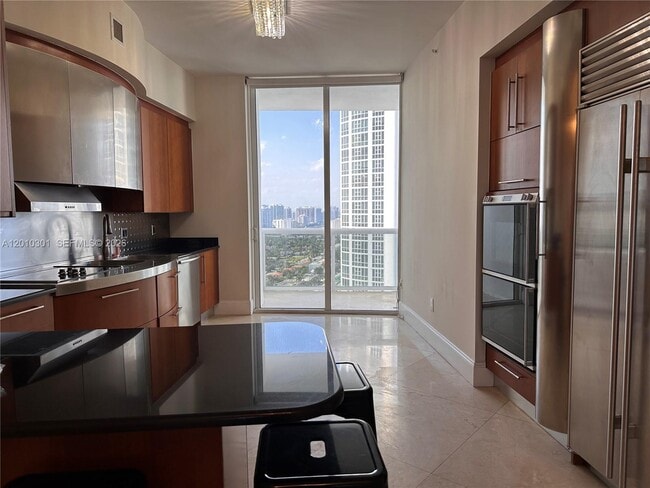 Building Photo - 18101 Collins Ave