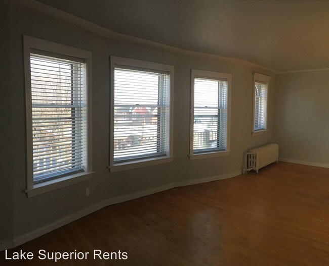 Building Photo - 109 S 15th Ave E