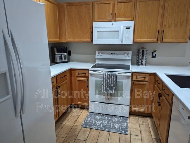 Building Photo - 9011 Iron Oaks Ave