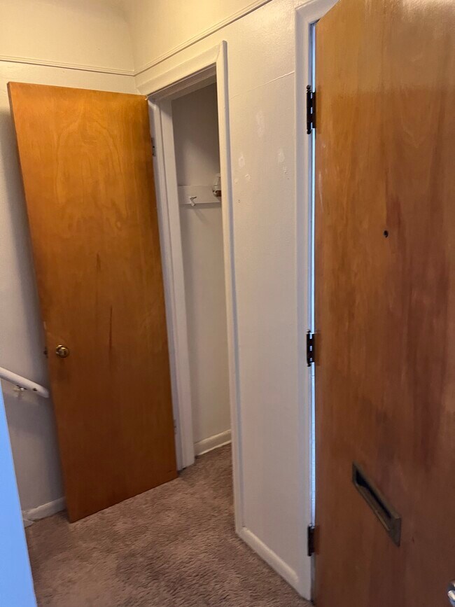 Closet at base of steps, next to front door - 9927 middlebelt rd