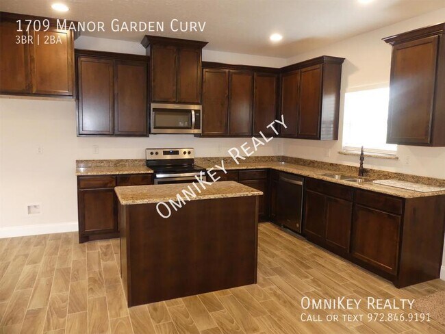 Foto del edificio - 1709 Manor Garden Curve