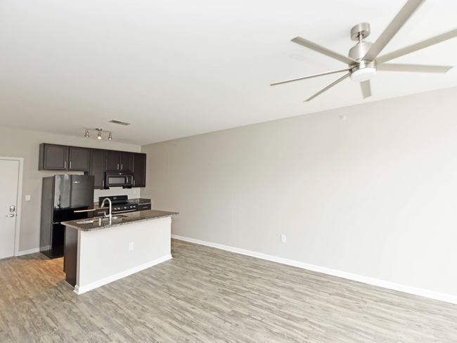 Living Room with Hardwood Style Flooring - The Woods