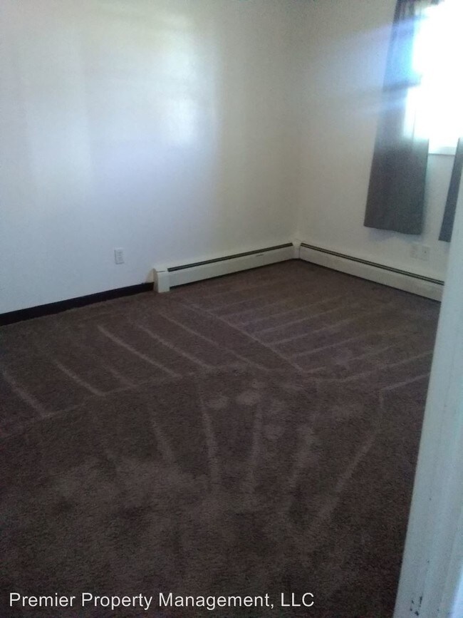 Building Photo - 201 3rd St S