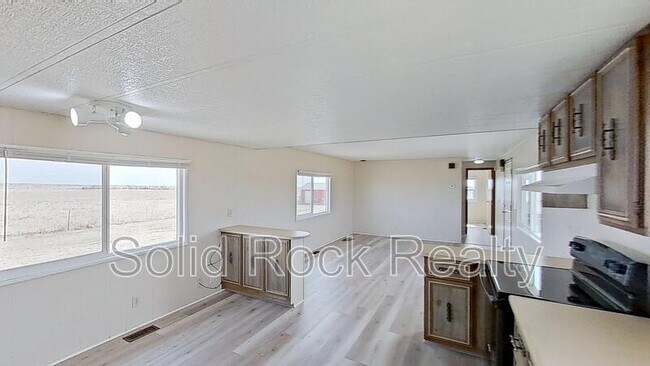 Building Photo - 9815 N Log Rd