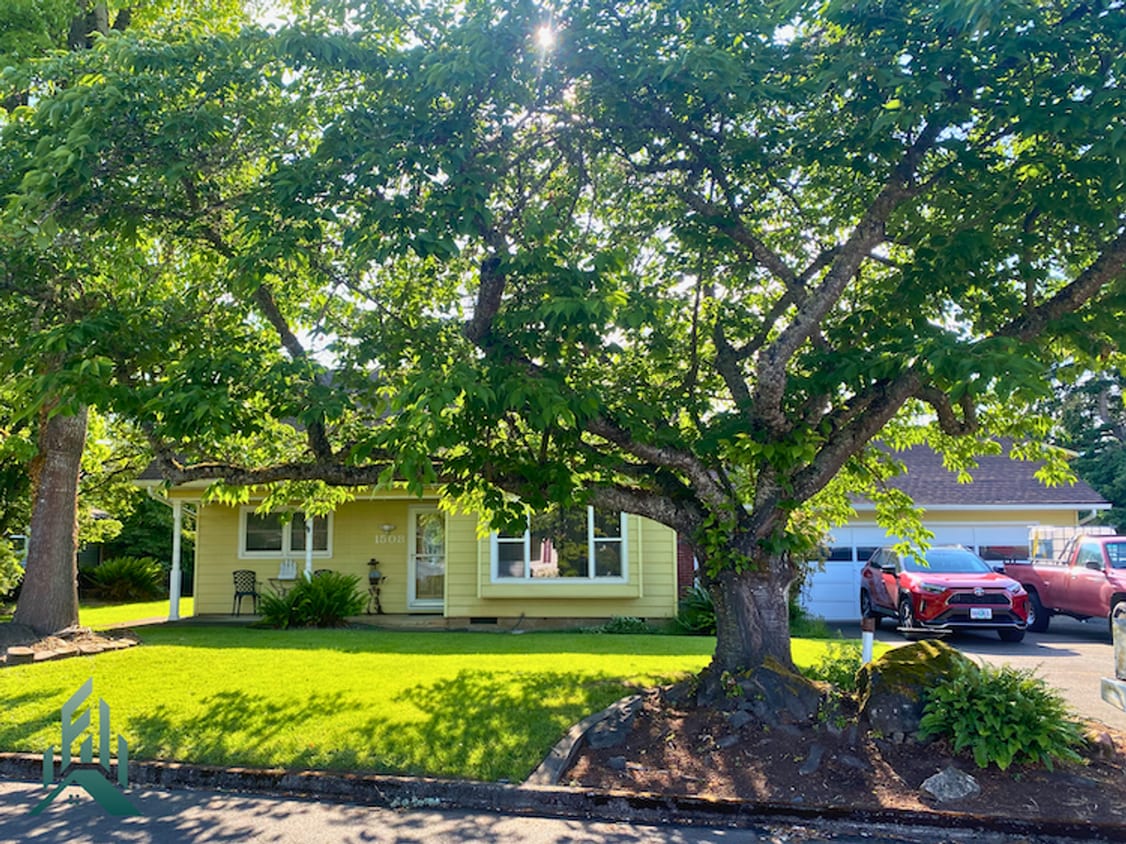 Primary Photo - Spacious 3-Bedroom Home with Huge Shop, RV...