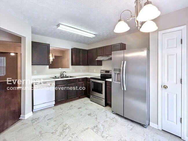 Foto del edificio - 5589 Strathmoor Manor Cir