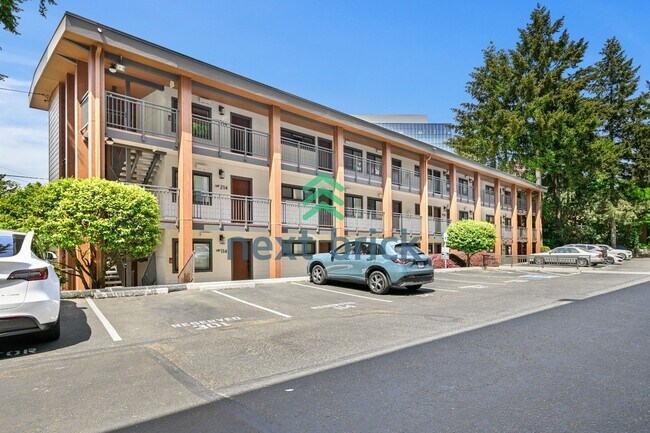 Building Photo - Bright & Remodeled Bellevue Condo | Steps to Downtown | Garage Included